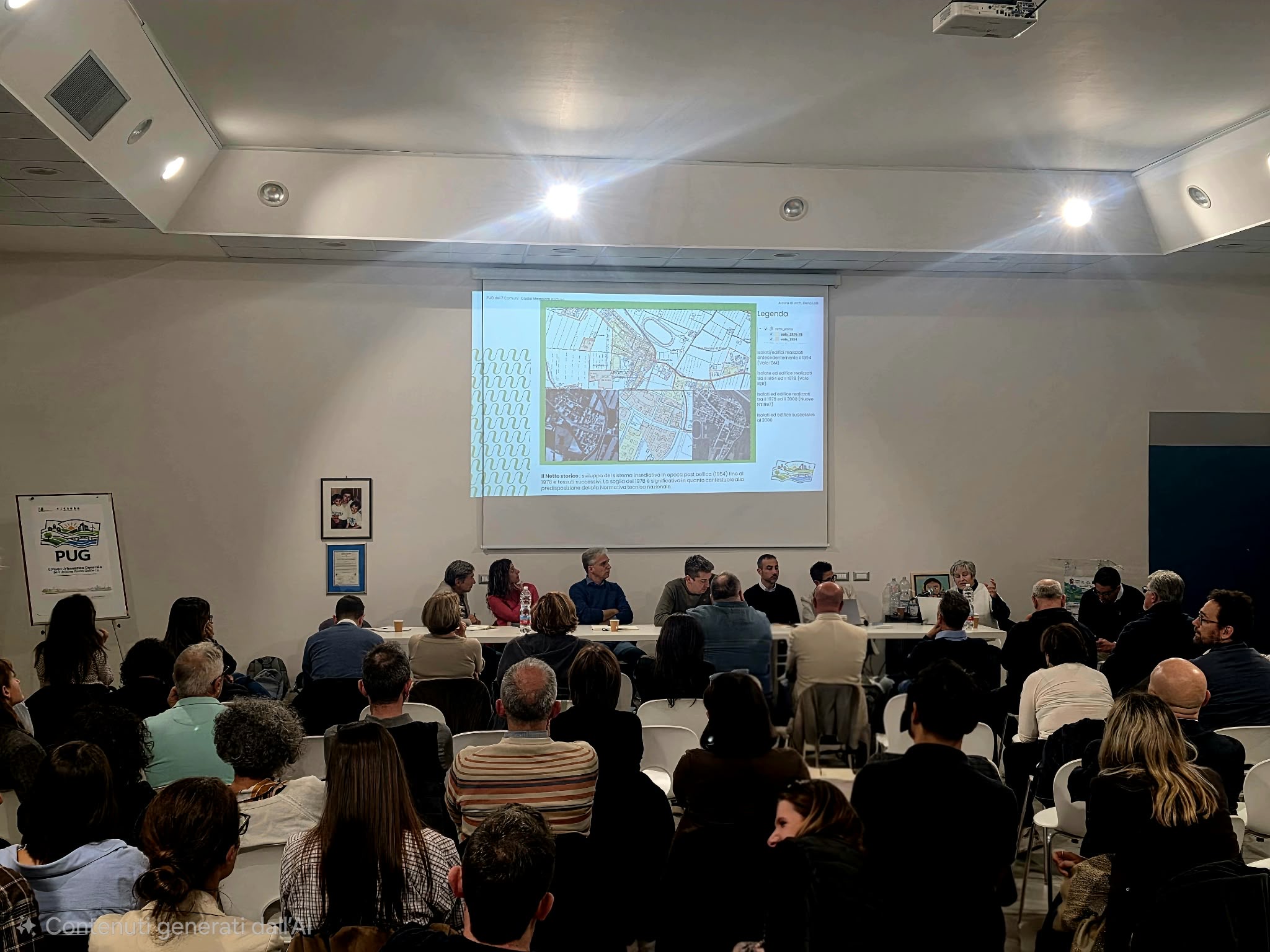 Un momento dell'incontro e il tavolo dei relatori